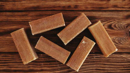 Laundry soap brown on a wooden background