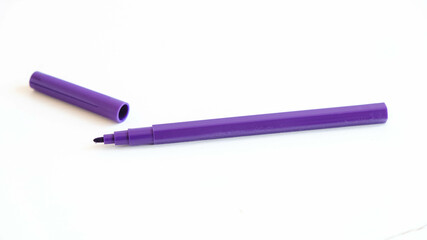 Purple felt-tip pen on a white background