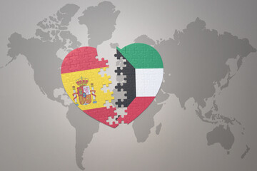puzzle heart with the national flag of kuwait and spain on a world map background. Concept.