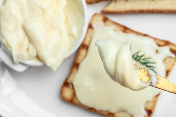 Fresh sandwich with cream cheese and butter for breakfast. melted cheese sandwich on light background. Food recipe background. Close up