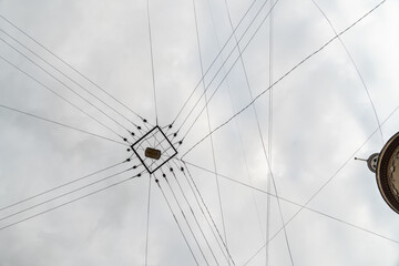 Obraz premium Cityscape of old town street with lot of wires