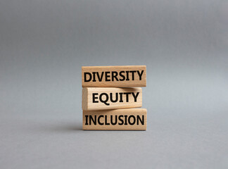 Diversity Equity Inclusion symbol. Concept words Diversity Equity Inclusion on wooden blocks....