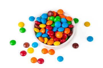 A Pile of Rainbow Colored Candy Coated Chocolate Buttons Isolated