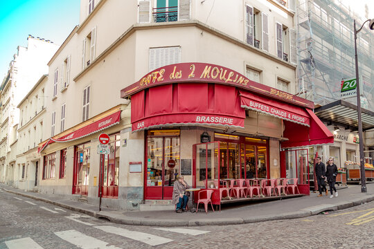 Paris, France, March 26, 2017: The Cafe des 2 Moulins French for "Two Windmills" is a cafe in the Montmartre