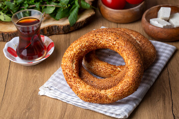 Turkish fast food bagel called Simit. Turkish bagel Simit with sesame. Bagel is traditional Turkish bakery food. Turkish name; simit - gevrek