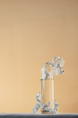 vertical shot, glass vase with flowers on the table, pastel colors