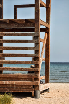 Lifeguard tower in Loutsa sandy beach (Artemida) in Athens, Greece, during sunny summer evening