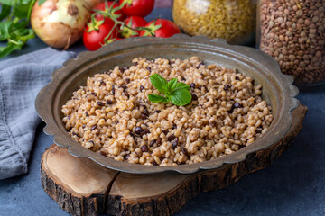 Traditional delicious Turkish foods; bulgur pilaf with green lentils (Turkish name; yesil mercimekli bulgur pilavi)