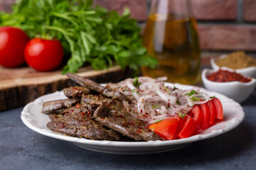 Traditional Turkish Liver kebab cuisine. Leaf Liver spicy. Delicious turkish ciger. (Turkish name; yaprak ciger)