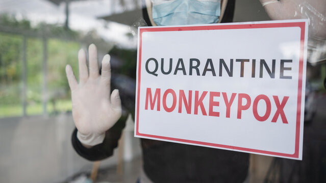 Monkeypox outbreak concept. Message paper quarantine to home isolation during monkeypox virus epidemic.