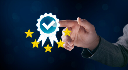 Businessman holding and showing the best quality assurance with golden five stars for guarantee...