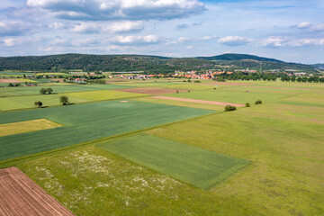 Fototapeta na wymiar landscape with field in the werra valley between Hesse and Thuringia at Herleshausen