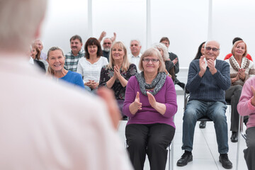 Old people in the seminar event. Many elderly in the conference