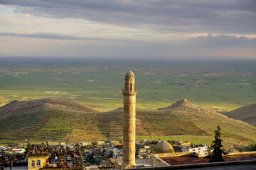 Artuklu Mardin, Turkey 7 May 2022 Mardin landscape at sunset with minaret of Ulu Cami, also known...