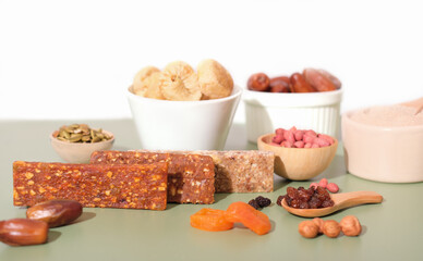 homemade energy bars made of nuts and dried fruits, vegetarian snack, sweet food for vegan. paleo diet dessert.