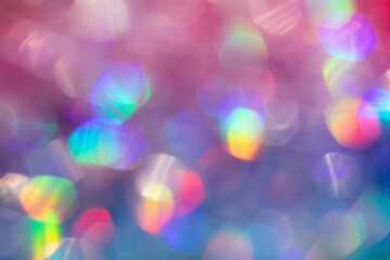 Abstract defocused multicolored background with shining glitter.Good as overlay layer.