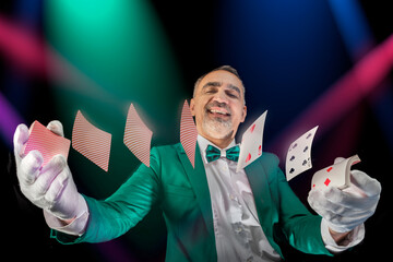 Magician with cards, Card manipulation, Croupier or casino dealer at gambling club or casino. Close...