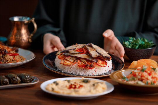 Kabsa, Hummus, Maqluba, Maqluba, Tabbouleh Close-up, Rice And Meat Dish, Middle Eastern National Traditional Food. Muslim Family Dinner, Ramadan, Iftar. Arabian Cuisine.