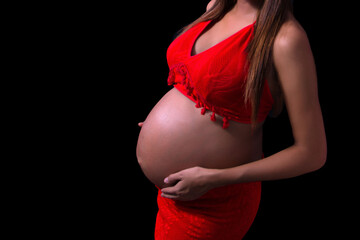 pregnant woman holding her belly