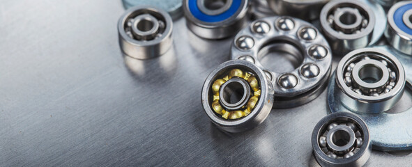 different bearings on a metal background. Part of mechanism.