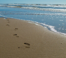 Fußspuren am Meer