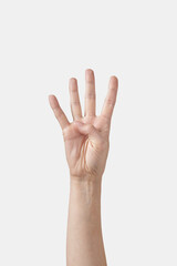 Obraz premium Counting on fingers, number four on white.