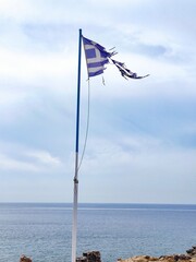 Damaged Greece flag, crisis in European Union