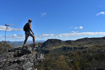 Naklejka na ściany i meble hiker on top of mountain