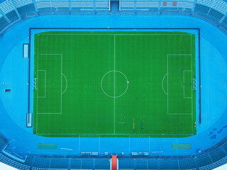 Aerial view of the football stadium. Soccer sports field and championship concept