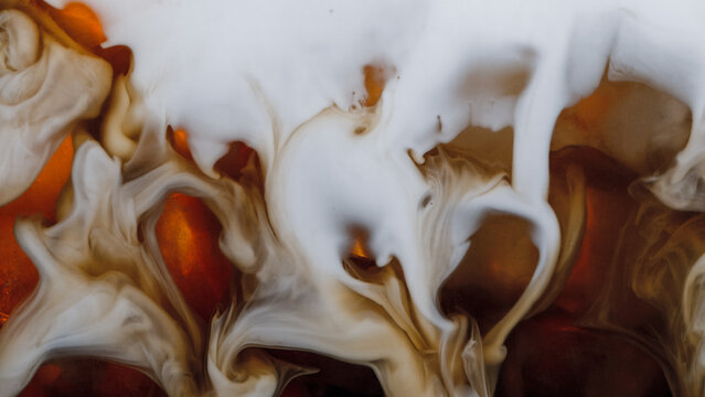 Super Slow Motion Shot of Pouring Cream into Ice Coffee, Close-up