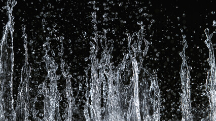 Freeze motion of water splash on black background. Filmed on high speed cinema camera, 1000 fps.