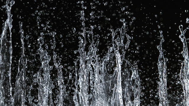 Freeze motion of water splash on black background. Filmed on high speed cinema camera, 1000 fps. © Lukas Gojda