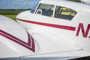 Norwich, Norfolk, UK &ndash; May 22 2022. Close up of cockpit windows and along the fuselage of a small airplane