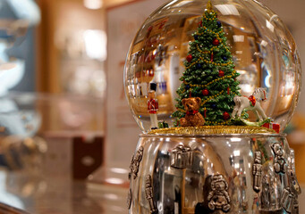 Christmas tree in a snow globe