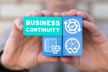 Business continuity planning - the process of creating systems of prevention and recovery to deal with potential threats to a company. Business continuity concept. - obrazy, fototapety, plakaty