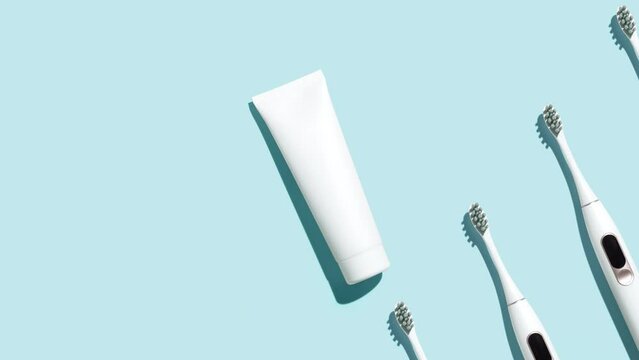 Pattern from mock up toothbrush and toothpaste on blue background - Stop motion animation