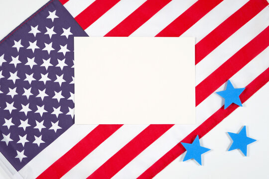 Horizontal 5x7 greeting card party invitation product mockup. Patriotic Fourth of July, Independence Day theme craft product mockup styled with USA Stars and Stripes flag against a white background.