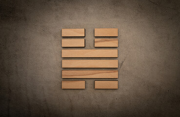 Gene Key 32 hexagram i ching wood on leather background human design