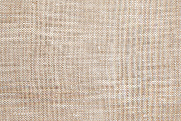 Naklejka na ściany i meble Textured background from natural linen fabric, natural color. 