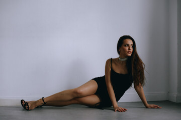 sexy girl on the floor in the studio