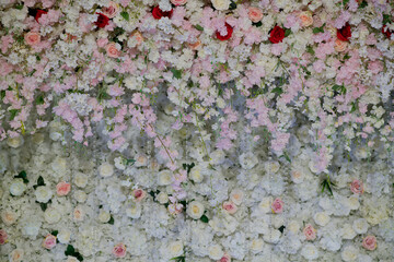 Fototapeta premium wedding backdrop, wedding flower decoration, rose wall, colorful background, fresh rose, bunch of flower 