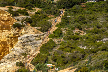 Tourists hiking on beautiful cliffs © Mauro Rodrigues