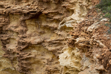 Natural sand formed by erosion of the elements