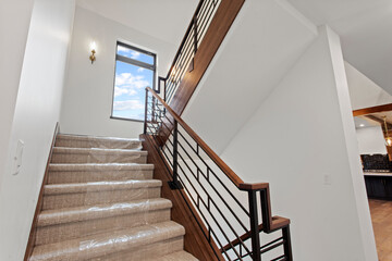Double staircase in home with carpet protection