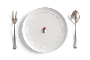 pill medicine consume plate empty fork spoon prescription drug ceramic remedy medic capsule red white tablet. taking pills after meals about diarrhea weight control or diet pills. 3D Illustration.
