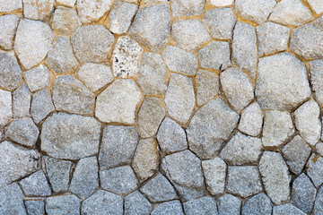 Stone wall design, stone fence background, outdoor day light