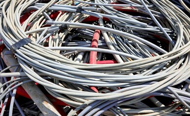 discarded copper electrical cable in the landfill for the separate collection of polluting...