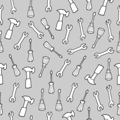 set of mechanic equipment on grey background. seamless pattern with sketch of mechanic tool, hand drawn vector. hammer, screwdriver and wrench illustration. doodle art for wallpaper, wrapping paper. 