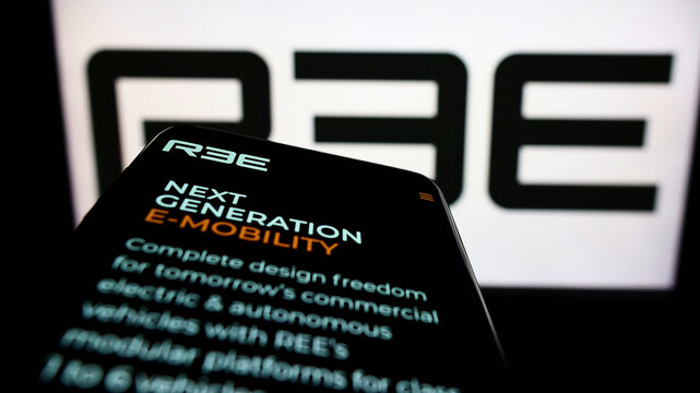 Stuttgart, Germany - 05-20-2022: Smartphone with website of Israeli company REE Automotive Ltd. on screen in front of business logo. Focus on top-left of phone display.