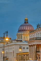 Fototapeta premium Historic buildings at Unter den Linden boulevard in Berlin at dusk